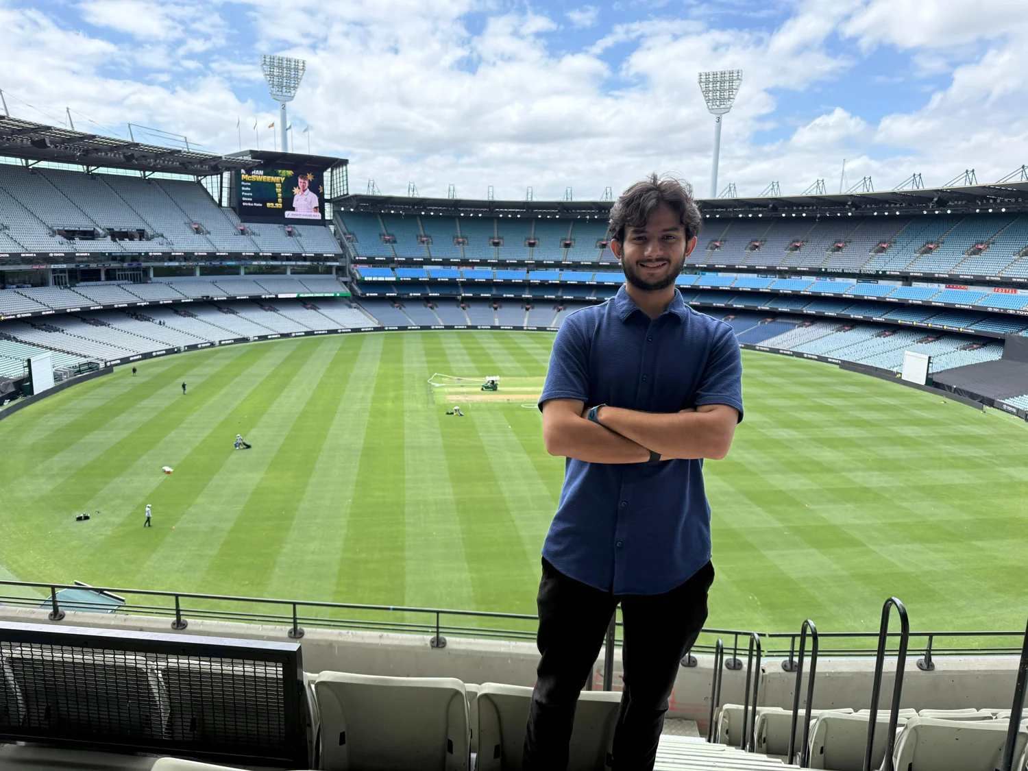 Jayneel standing at the Melbourne Cricket Ground